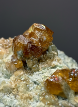 Load image into Gallery viewer, Hessonite Garnet Cluster on Matrix – Natural Collector Specimen from Pakistan | High-Grade Orange-Red Garnet Crystals