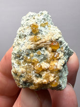 Load image into Gallery viewer, Hessonite Garnet Cluster on Matrix – Natural Collector Specimen from Pakistan | High-Grade Orange-Red Garnet Crystals
