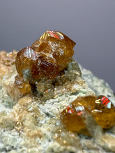 Load image into Gallery viewer, Hessonite Garnet Cluster on Matrix – Natural Collector Specimen from Pakistan | High-Grade Orange-Red Garnet Crystals