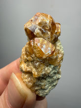 Load image into Gallery viewer, Hessonite Garnet Cluster on Matrix – Natural Collector Specimen from Pakistan | High-Grade Orange-Red Garnet Crystals