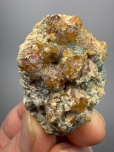 Load image into Gallery viewer, Hessonite Garnet Cluster on Matrix – Natural Collector Specimen from Pakistan | High-Grade Orange-Red Garnet Crystals