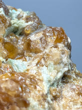 Load image into Gallery viewer, Hessonite Garnet Cluster on Matrix – Natural Collector Specimen from Pakistan | High-Grade Orange-Red Garnet Crystals