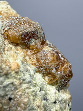 Load image into Gallery viewer, Hessonite Garnet Cluster on Matrix – Natural Collector Specimen from Pakistan | High-Grade Orange-Red Garnet Crystals