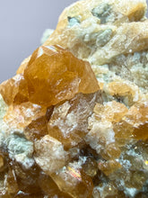 Load image into Gallery viewer, Hessonite Garnet Cluster on Matrix – Natural Collector Specimen from Pakistan | High-Grade Orange-Red Garnet Crystals
