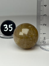 Load image into Gallery viewer, Golden Rutile Quartz (AKA Golden Angel Hair Quartz) Sphere