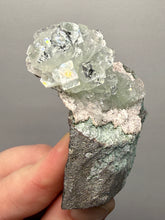Load image into Gallery viewer, Light Mint Green “Disco Ball” Radial Apophyllite on Pink & Green Heulandite — Deccan Traps, India