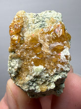 Load image into Gallery viewer, Hessonite Garnet Cluster on Matrix – Natural Collector Specimen from Pakistan | High-Grade Orange-Red Garnet Crystals