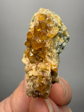Load image into Gallery viewer, Hessonite Garnet Cluster on Matrix – Natural Collector Specimen from Pakistan | High-Grade Orange-Red Garnet Crystals