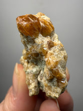 Load image into Gallery viewer, Hessonite Garnet Cluster on Matrix – Natural Collector Specimen from Pakistan | High-Grade Orange-Red Garnet Crystals