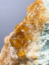 Load image into Gallery viewer, Hessonite Garnet Cluster on Matrix – Natural Collector Specimen from Pakistan | High-Grade Orange-Red Garnet Crystals