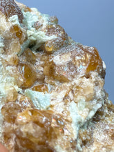 Load image into Gallery viewer, Hessonite Garnet Cluster on Matrix – Natural Collector Specimen from Pakistan | High-Grade Orange-Red Garnet Crystals