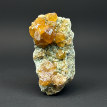 Load image into Gallery viewer, Hessonite Garnet Cluster on Matrix – Natural Collector Specimen from Pakistan | High-Grade Orange-Red Garnet Crystals