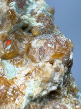 Load image into Gallery viewer, Hessonite Garnet Cluster on Matrix – Natural Collector Specimen from Pakistan | High-Grade Orange-Red Garnet Crystals
