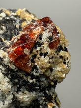 Load image into Gallery viewer, Naturally Faceted Zircon Crystal on Pegmatite–Biotite Matrix • Pakistan Mineral Specimen
