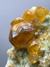 Load image into Gallery viewer, Hessonite Garnet Cluster on Matrix – Natural Collector Specimen from Pakistan | High-Grade Orange-Red Garnet Crystals
