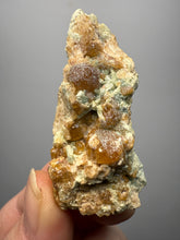 Load image into Gallery viewer, Hessonite Garnet Cluster on Matrix – Natural Collector Specimen from Pakistan | High-Grade Orange-Red Garnet Crystals
