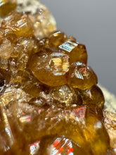 Load image into Gallery viewer, Hessonite Garnet Cluster on Matrix – Natural Collector Specimen from Pakistan | High-Grade Orange-Red Garnet Crystals

