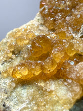 Load image into Gallery viewer, Hessonite Garnet Cluster on Matrix – Natural Collector Specimen from Pakistan | High-Grade Orange-Red Garnet Crystals

