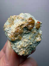 Load image into Gallery viewer, Hessonite Garnet Cluster on Matrix – Natural Collector Specimen from Pakistan | High-Grade Orange-Red Garnet Crystals
