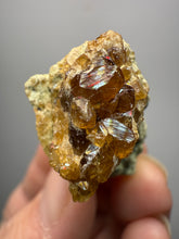 Load image into Gallery viewer, Hessonite Garnet Cluster on Matrix – Natural Collector Specimen from Pakistan | High-Grade Orange-Red Garnet Crystals
