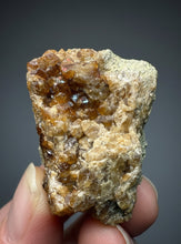 Load image into Gallery viewer, Hessonite Garnet Cluster on Matrix – Natural Collector Specimen from Pakistan | High-Grade Orange-Red Garnet Crystals
