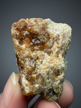 Load image into Gallery viewer, Hessonite Garnet Cluster on Matrix – Natural Collector Specimen from Pakistan | High-Grade Orange-Red Garnet Crystals
