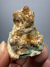 Load image into Gallery viewer, Hessonite Garnet Cluster on Matrix – Natural Collector Specimen from Pakistan | High-Grade Orange-Red Garnet Crystals
