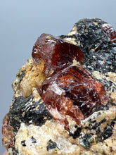 Load image into Gallery viewer, Naturally Faceted Zircon Crystal on Pegmatite–Biotite Matrix • Pakistan Mineral Specimen

