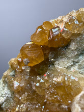 Load image into Gallery viewer, Hessonite Garnet Cluster on Matrix – Natural Collector Specimen from Pakistan | High-Grade Orange-Red Garnet Crystals
