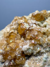 Load image into Gallery viewer, Hessonite Garnet Cluster on Matrix – Natural Collector Specimen from Pakistan | High-Grade Orange-Red Garnet Crystals
