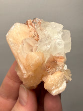 Load image into Gallery viewer, Gemmy Peach Stilbite Flower + Apophyllite on Red Heulandite — Maharashtra, India
