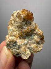 Load image into Gallery viewer, Hessonite Garnet Cluster on Matrix – Natural Collector Specimen from Pakistan | High-Grade Orange-Red Garnet Crystals
