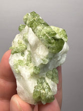 Load image into Gallery viewer, Electric Green Diopside on Quartz – Collector Mineral Specimen (Gilgit-Baltistan) Pakistan
