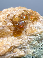 Load image into Gallery viewer, Hessonite Garnet Cluster on Matrix – Natural Collector Specimen from Pakistan | High-Grade Orange-Red Garnet Crystals
