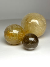 Load image into Gallery viewer, Golden Rutile Quartz (AKA Golden Angel Hair Quartz) Sphere
