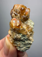 Load image into Gallery viewer, Hessonite Garnet Cluster on Matrix – Natural Collector Specimen from Pakistan | High-Grade Orange-Red Garnet Crystals
