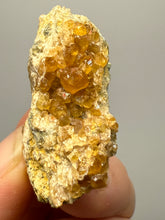 Load image into Gallery viewer, Hessonite Garnet Cluster on Matrix – Natural Collector Specimen from Pakistan | High-Grade Orange-Red Garnet Crystals

