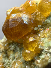 Load image into Gallery viewer, Hessonite Garnet Cluster on Matrix – Natural Collector Specimen from Pakistan | High-Grade Orange-Red Garnet Crystals
