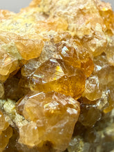 Load image into Gallery viewer, Hessonite Garnet Cluster on Matrix – Natural Collector Specimen from Pakistan | High-Grade Orange-Red Garnet Crystals
