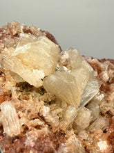 Load image into Gallery viewer, Shiny Peach Stilbite on Druzy Red Heulandite – High-Grade Collector Mineral Specimen from India
