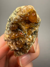 Load image into Gallery viewer, Hessonite Garnet Cluster on Matrix – Natural Collector Specimen from Pakistan | High-Grade Orange-Red Garnet Crystals

