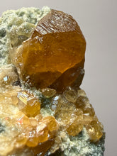 Load image into Gallery viewer, Hessonite Garnet Cluster on Matrix – Natural Collector Specimen from Pakistan | High-Grade Orange-Red Garnet Crystals

