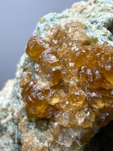 Load image into Gallery viewer, Hessonite Garnet Cluster on Matrix – Natural Collector Specimen from Pakistan | High-Grade Orange-Red Garnet Crystals
