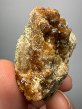 Load image into Gallery viewer, Hessonite Garnet Cluster on Matrix – Natural Collector Specimen from Pakistan | High-Grade Orange-Red Garnet Crystals
