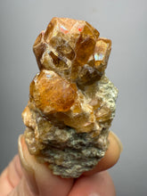 Load image into Gallery viewer, Hessonite Garnet Cluster on Matrix – Natural Collector Specimen from Pakistan | High-Grade Orange-Red Garnet Crystals
