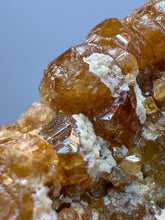 Load image into Gallery viewer, Hessonite Garnet Cluster on Matrix – Natural Collector Specimen from Pakistan | High-Grade Orange-Red Garnet Crystals

