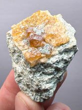 Load image into Gallery viewer, Hessonite Garnet Cluster on Matrix – Natural Collector Specimen from Pakistan | High-Grade Orange-Red Garnet Crystals
