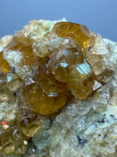 Load image into Gallery viewer, Hessonite Garnet Cluster on Matrix – Natural Collector Specimen from Pakistan | High-Grade Orange-Red Garnet Crystals

