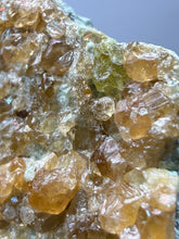 Load image into Gallery viewer, Hessonite Garnet Cluster on Matrix – Natural Collector Specimen from Pakistan | High-Grade Orange-Red Garnet Crystals
