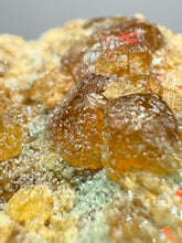 Load image into Gallery viewer, Hessonite Garnet Cluster on Matrix – Natural Collector Specimen from Pakistan | High-Grade Orange-Red Garnet Crystals
